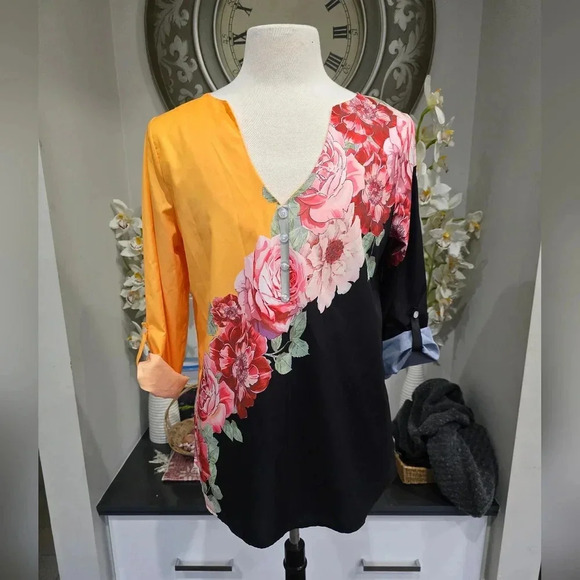 Embrace Bold Style with This Eye-Catching Floral Top - Picture 2 of 7